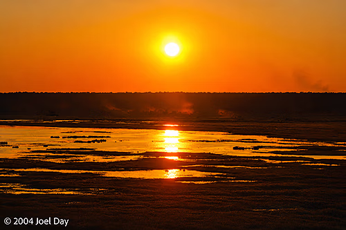 Sunset at Nawurlandja lookout over Anbangbang Billabong to Burrungkuy (Nourlangie) and the Arnhem Land escarpment.