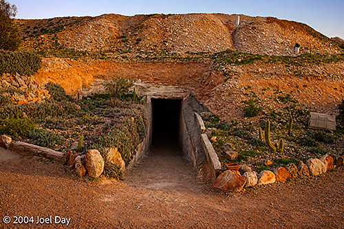 Disused opal mine entrance to underground campsite in Opal mine in Coober Pedy, South Australia 
