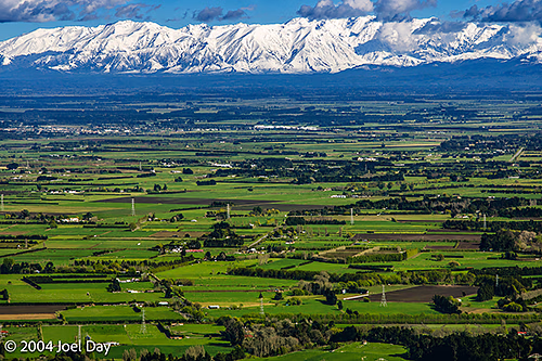 Farmland and Mountains near Christchurch, South Island, New Zealand