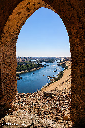 The Nile River flowing past Aswan, Egypt