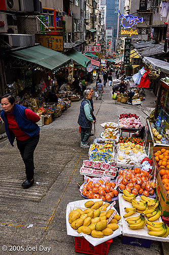 Busy street market in hilly Hong Kong, China