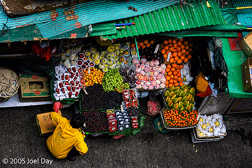 Fruit market in hilly street in Hong Kong, China