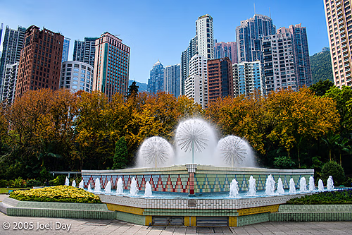 City park surrounded by skyscrapers, Hong Kong, China