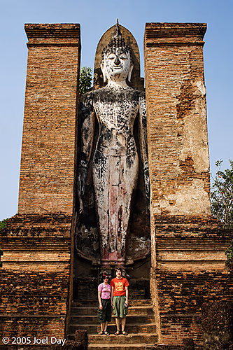 German Tourists in Sukhothai Temple ruins, former capital of the Sukhothai Kingdom (also known as the Kingdom of Siam), Sukhothai, Thailand