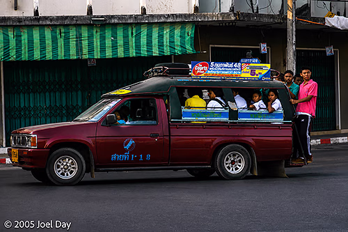 Thais running errands around Krabi, Thailand