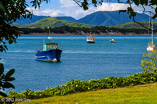 Boats moored on the Endeavour River next to Cooktown, Queensland